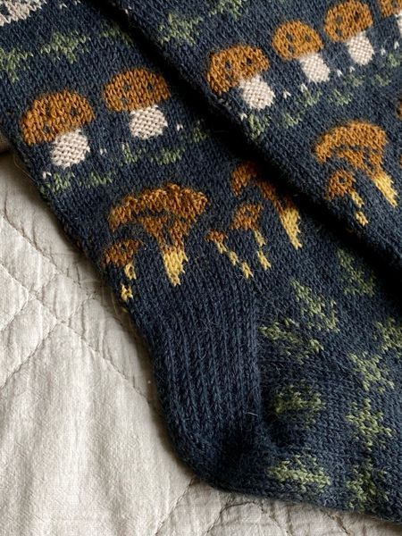 Woolen socks with mushroom pattern